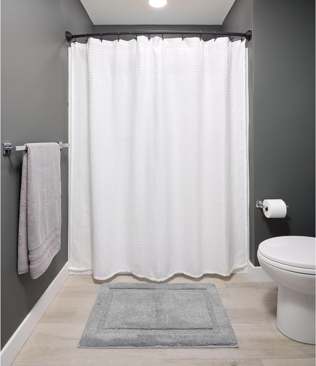 iDesign Curved Metal Shower Curtain Rod, Adjustable Customizable Curtain Rod for Bathtub, Stall, Closet, Doorway, 41-72 Inches, Matte Black,79077